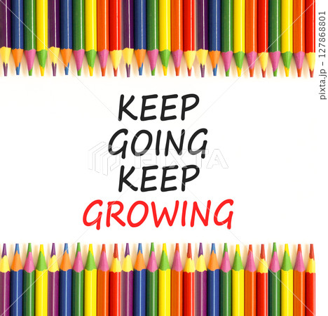 Keep going and growing symbol. Concept words phrase Keep going keep growing on beautiful paper. Colored pencils. Beautiful white paper background. Business Keep going and growing concept. Copy space. 127868801