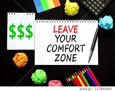 Leave your comfort zone symbol. Concept words Leave your comfort zone on beautiful white note. Beautiful black background. Business psychological Leave your comfort zone concept. Copy space. Leave your comfort zone symbol. Concept words Leave your comfort zone on beautiful white note. Beautiful black background. Business psychological Leave your comfort zone concept. Copy space. 127868802