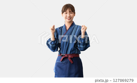 ガッツポーズをする居酒屋スタッフの若い日本人女性 ガッツポーズをする居酒屋スタッフの若い日本人女性 127869279