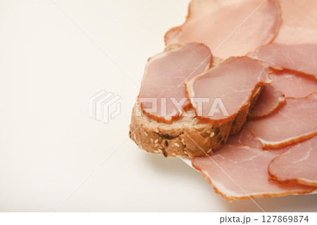 Ham sandwiches. Ham cut into thin slices. Ham sandwiches. Ham cut into thin slices. 127869874