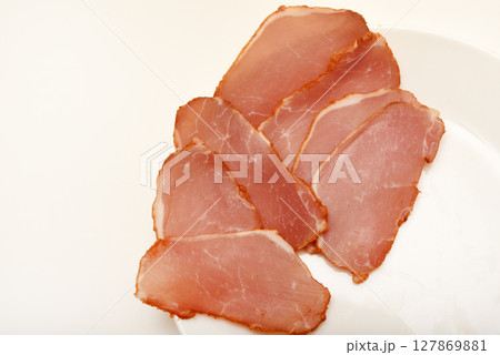 Ham cut into thin slices. 127869881