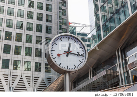 Contemporary Urban Clock in Business District with Modern Glass Office Towers Contemporary Urban Clock in Business District with Modern Glass Office Towers 127869891