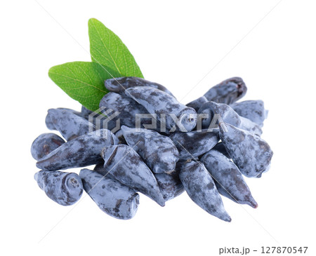 Honeysuckle berry isolated on white background. Fresh honeysuckle blue berry fruits with green leaves. Clipping path. 127870547