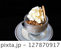 Cup of ice cream with crumble nuts and whipped cream in Keerbergen, Flemish Brabant, Belgium 127870917