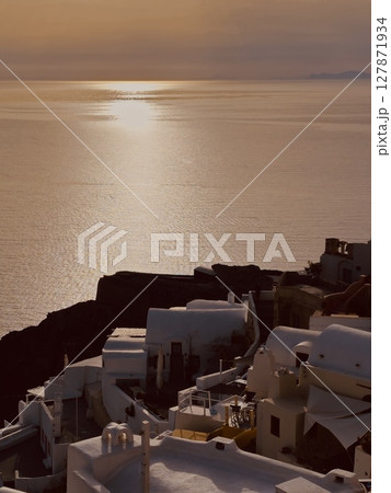 Waiting for the sunset on the heavenly Greek island of Santorini in the town of Oia Waiting for the sunset on the heavenly Greek island of Santorini in the town of Oia 127871934