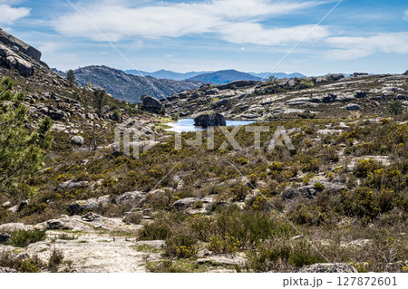 Beautiful lake at top of Penameda hill in national park Peneda Geres in Portugal. Beautiful lake at top of Penameda hill in national park Peneda Geres in Portugal. 127872601