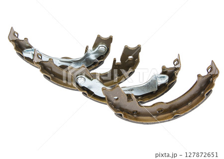 New brake pads for disc brakes on white New brake pads for disc brakes on white 127872651