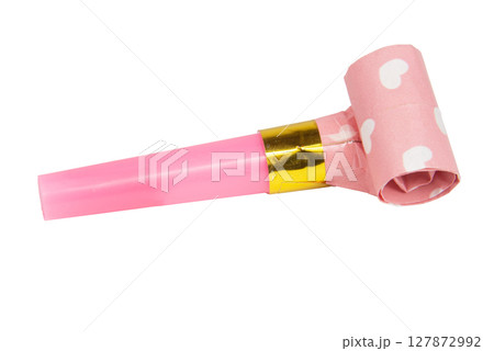 Rolled festive noisemaker or party whistle horn isolated on the white background Rolled festive noisemaker or party whistle horn isolated on the white background 127872992