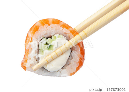 Sushi roll with chopsticks isolated on white Sushi roll with chopsticks isolated on white 127873001