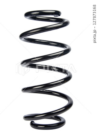 Car spare part. Large metal spring on white background. cushioning spring over white background, auto spare parts. automotive suspension springs 127873168