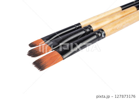 Artistic brushes isolated on on white background 127873176