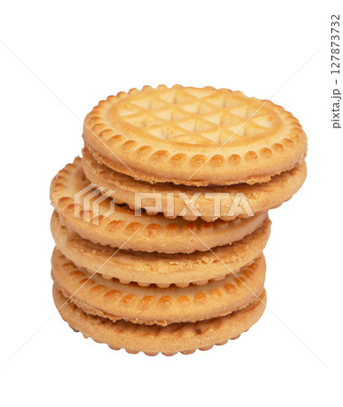 Tasty sandwich cookie with cream isolated on white Tasty sandwich cookie with cream isolated on white 127873732