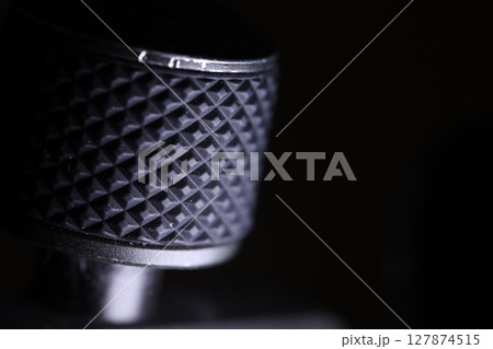 Gadget settings elements close up, macro photo, details on a dark background 127874515