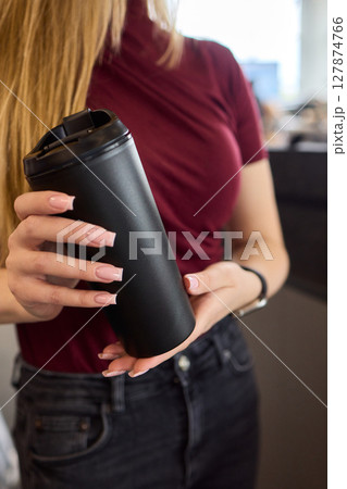 A Stylish Drink Container Perfect for Use in a Modern Car Interior, Both Functional and Fashionable 127874766