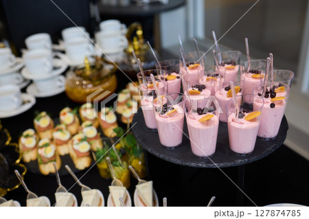 A Vibrantly Colorful Appetizer Platter Featuring Skewers and a Variety of Fresh Ingredients 127874785