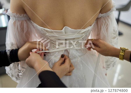 Bridal Preparation The Art of Lacing the Exquisite Wedding Dress for the Special Day Bridal Preparation The Art of Lacing the Exquisite Wedding Dress for the Special Day 127874800