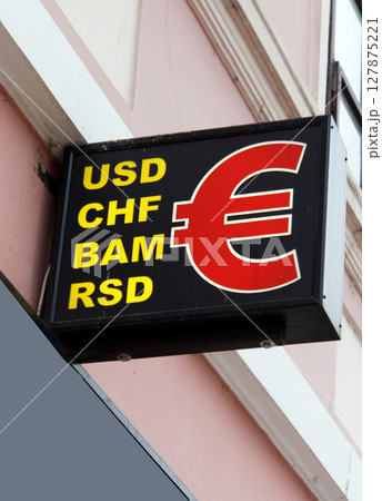 Currency exchange advertising sign 127875221