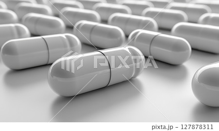 assortment of all white vitamin capsules is displayed in abstract, futuristic pattern on clean white backdrop, highlighting minimalist aesthetic conveys purity and modernity 127878311