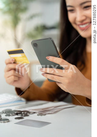 Digital Banking. Happy woman shopping online with credit card and smartphone. Digital Banking. Happy woman shopping online with credit card and smartphone. 127880295