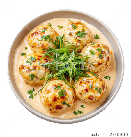 Light and Airy Pike Fish Quenelles Served with Creamy Sauce Nantua in a Beautiful Bowl Presentation Light and Airy Pike Fish Quenelles Served with Creamy Sauce Nantua in a Beautiful Bowl Presentation 127881610