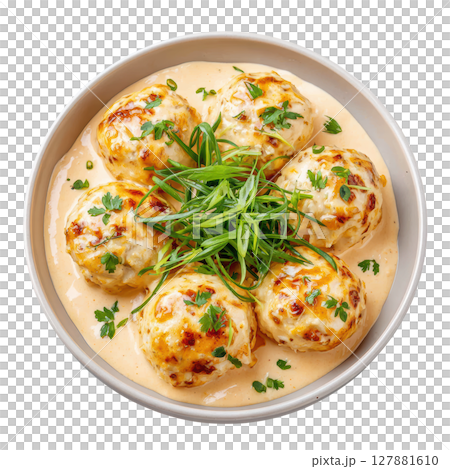 Light and Airy Pike Fish Quenelles Served with Creamy Sauce Nantua in a Beautiful Bowl Presentation Light and Airy Pike Fish Quenelles Served with Creamy Sauce Nantua in a Beautiful Bowl Presentation 127881610