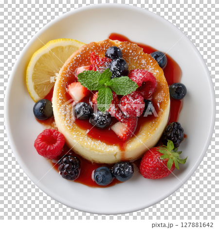 Creamy Lemon Ricotta Cheesecake with Fresh Berries and Citrus Sauce on a White Plate for Culinary Delight 127881642