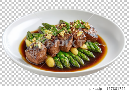 Delicious Pan-Seared Wagyu Beef Cubes with Black Pepper Sauce on Crisp Asparagus Spears 127881723