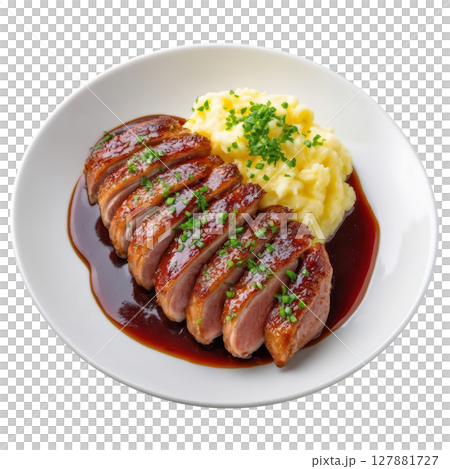 Seared Duck Breast Cooked to Perfect Medium Rare with Crispy Skin and Mashed Potatoes in Elegant Presentation 127881727