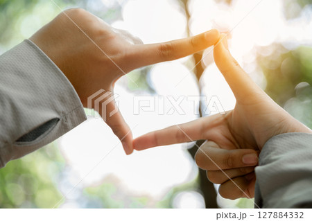 Young woman hand reaching for mountains. Spiritual girl smiling to sky. Happy female being thankful. Spiritual girl praying with hope. Positive asian young woman feeling hope and faith looking up. Young woman hand reaching for mountains. Spiritual girl smiling to sky. Happy female being thankful. Spiritual girl praying with hope. Positive asian young woman feeling hope and faith looking up. 127884332