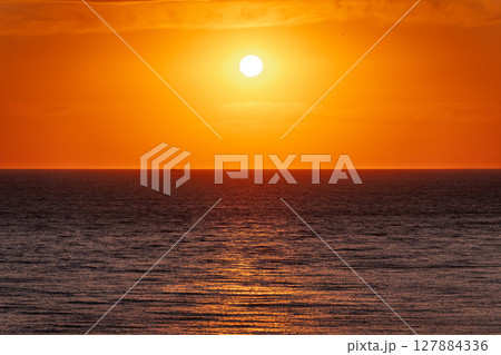 Beautiful red and orange sunrise over the sea. 127884336
