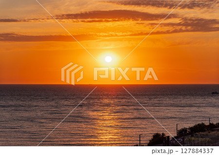 Beautiful red and orange sunrise over the sea. 127884337