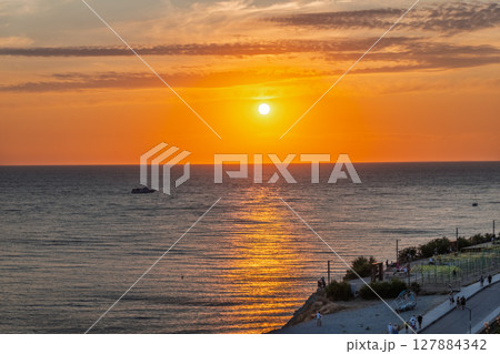 The red sunset over the sea in Anapa The red sunset over the sea in Anapa 127884342