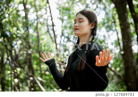 Grateful woman having HOPE praying to God. Spiritual girl smiling to sky. Happy female being thankful. Spiritual girl praying with hope. Positive asian young woman feeling hope and faith looking up. Grateful woman having HOPE praying to God. Spiritual girl smiling to sky. Happy female being thankful. Spiritual girl praying with hope. Positive asian young woman feeling hope and faith looking up. 127884781