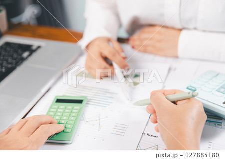 Business people working on sustainable innovation project. renewable energy concept. Teamwork Meeting, partner on model building company office technology, based green businesses and global warming. 127885180