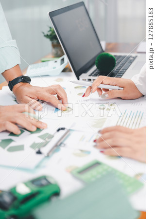 Business people working on sustainable innovation project. renewable energy concept. Teamwork Meeting, partner on model building company office technology, based green businesses and global warming. Business people working on sustainable innovation project. renewable energy concept. Teamwork Meeting, partner on model building company office technology, based green businesses and global warming. 127885183
