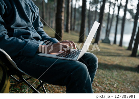 Future remote work combines technology nature smart phone enable e-learning productivity while traveling blending comfort modern devices serenity computer equipment business connection natural world Future remote work combines technology nature smart phone enable e-learning productivity while traveling blending comfort modern devices serenity computer equipment business connection natural world 127885991