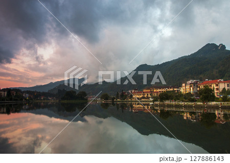 Aerial view of Sapa city nested in green valley in Loa Cai, Vietnam 127886143