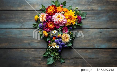 A bouquet of flowers arranged in the shape of a head, symbolizing mental health and well-being 127889348