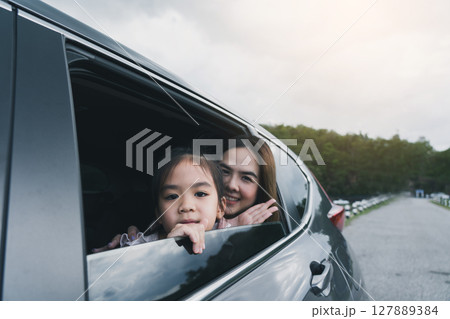 Summer vacation happy mother and daughter having fun. The concept of family on vacation and travel. Summer vacation happy mother and daughter having fun. The concept of family on vacation and travel. 127889384
