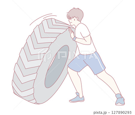 Individual Engaged in Training with a Tire to Enhance Strength and Overall Fitness Levels 127890293