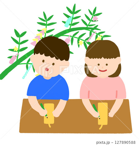 短冊に願いごとを書く子供たち 127890588