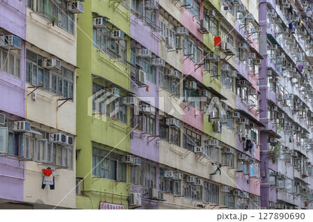 June 29 2025 Urban Apartment Exterior with Peeling Paint and Multiple Small Windows June 29 2025 Urban Apartment Exterior with Peeling Paint and Multiple Small Windows 127890690