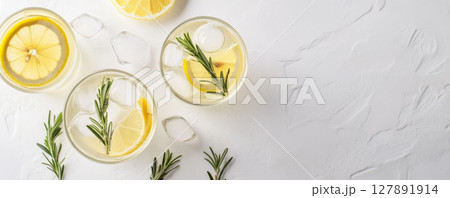 Refreshing Lemon Drink with Rosemary and Ice Cubes 127891914