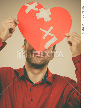 Smiling man with healed heart. 127894075