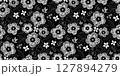 Black and white seamless floral pattern with hand-drawn flowers and leaves. Ideal for fabric prints, wallpapers, gift wrap, stationery, textile, and spring or summer-themed designs. 127894279