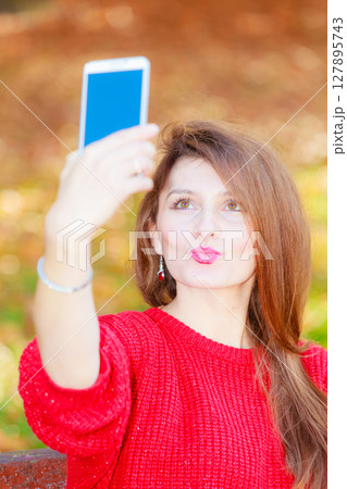 Gorgeous girl taking selfie. Gorgeous girl taking selfie. 127895743