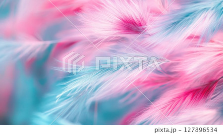Soft pink and blue feathery textures blend into a dreamy abstract background Soft pink and blue feathery textures blend into a dreamy abstract background 127896534