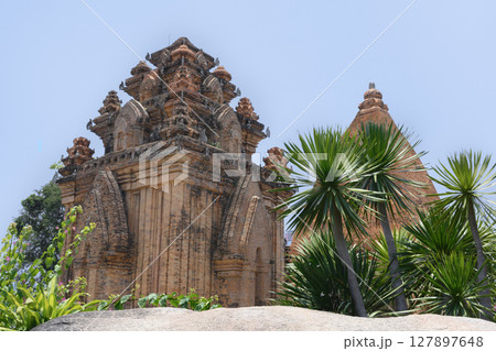 Ancient sacred North Po Nagar Cham Tower of the 12th century among trees in Nha Trang, Vietnam Ancient sacred North Po Nagar Cham Tower of the 12th century among trees in Nha Trang, Vietnam 127897648
