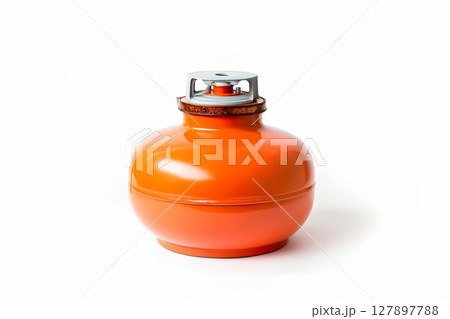 Orange propane gas cylinder standing on a white background, essential equipment for outdoor cooking and heating 127897788
