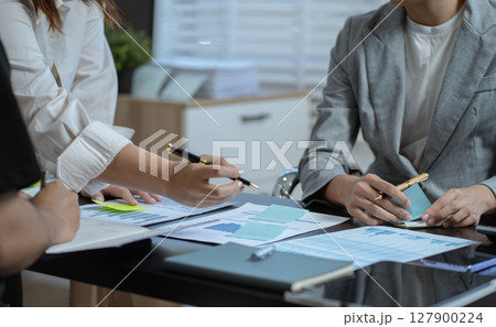 Business meeting account managers crew working search page on computer with new startup project. Idea presentation, analyze plans. Business meeting account managers crew working search page on computer with new startup project. Idea presentation, analyze plans. 127900224